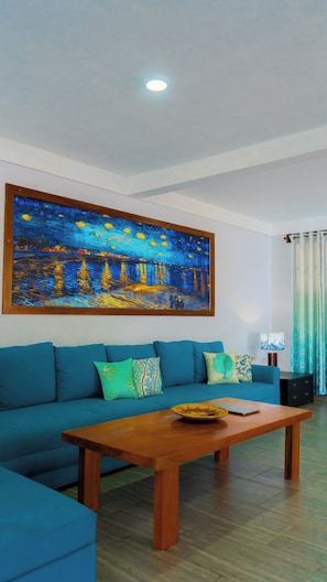 living room. Couch turns to a queen size bed
