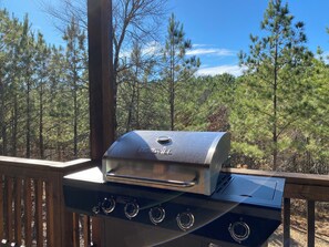 Grill outdoors with Nexgrill—everything tastes better under the pines! 