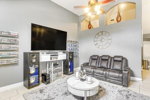 Living Room | DVD Cases (Decor Only) | In-Home Theater System