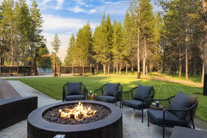 Fire pit in the spacious yard.