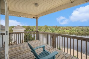 Relax on the deck with a peaceful, serene view of the creek.