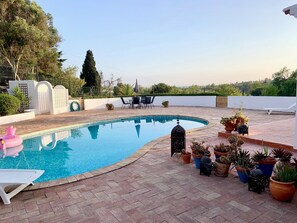Pool, seating and barbecue areas