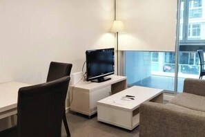 Dining and living with two seaters sofa