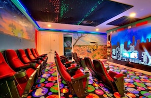 Experience cinematic luxury in our state-of-the-art home theater