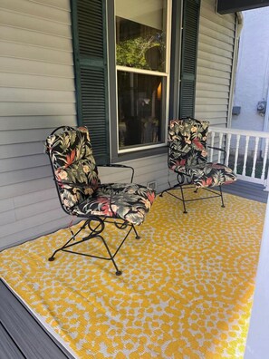 Porch Sitting in cushioned chairs (4), with porch privacy shade from sun