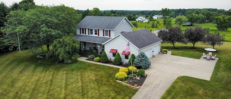 Spacious 3 Car Garage & Plenty Of Parking For Trailers Or RV.