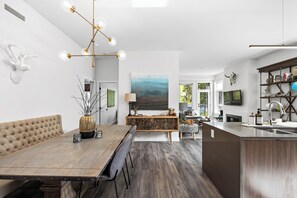Spacious condo with lots of room to dine or play games around the gorgeous dining table