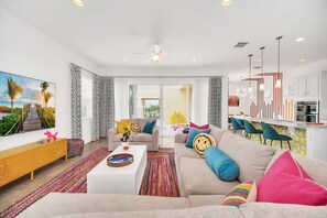 Gather in the spacious living room, designed with comfort in mind and ideal for entertaining guests or enjoying family time