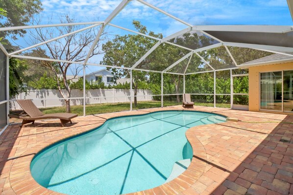 Enjoy your own private backyard retreat in this lovely Bonita Springs home - less than 2 miles from the beach!