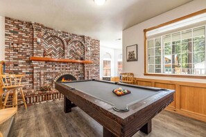 This tranquil escape offers many fun amenities such as a pool table, arcade games and multiple Smart TVs for streaming.
