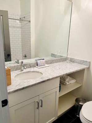 En-Suite (Private Bathroom) with large Vanity and Carrera Marble Countertop!