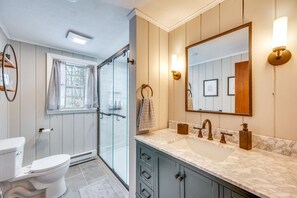 Neutral color palette with wood accents for a warm and inviting feel.