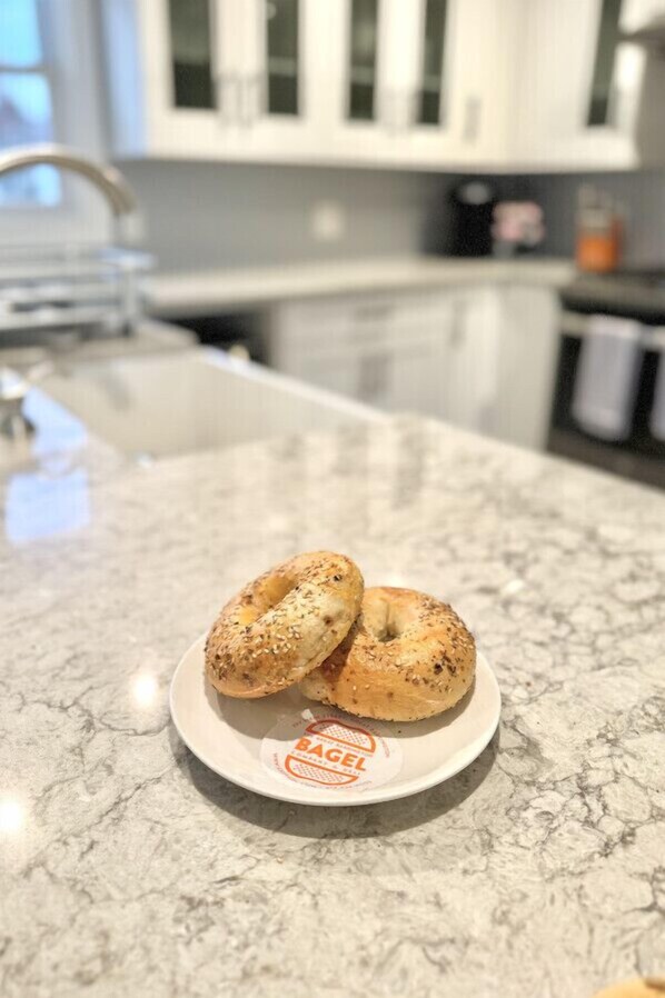 Start Your Day Right  - Enjoy Complimentary Fresh Bagels From Around the Corner!
