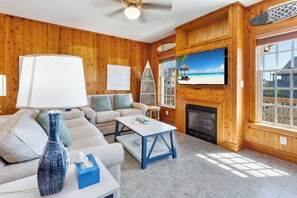 Relax in the gorgeous Living Area with rustic tongue and groove juniper walls!