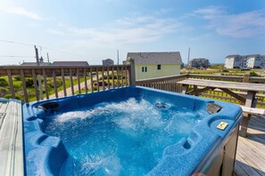 Relax in the bubbly Hot Tub and enjoy views of the ocean!