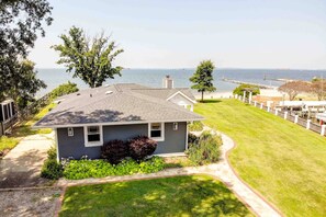 The 3-bedroom home has an expansive waterfront yard.