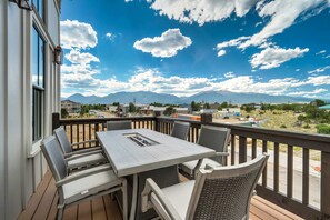 Take in stunning mountain views from the spacious outdoor deck.
