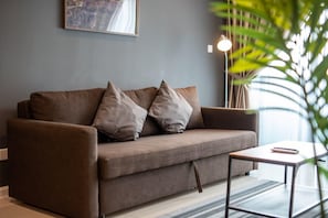 The 3-seater sofa bed it's double bed form.
