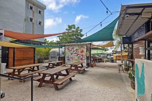 Lote 23 is a trendy and fun place to eat a variety of food options and it is just a 6-8 minute Uber away!