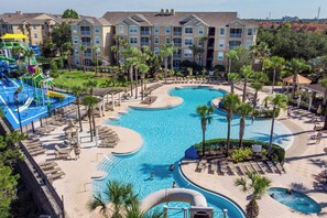 Enjoy free access to resort-style amenities, including a stunning pool, water park, hot tub, sun loungers, and shaded cabanas.