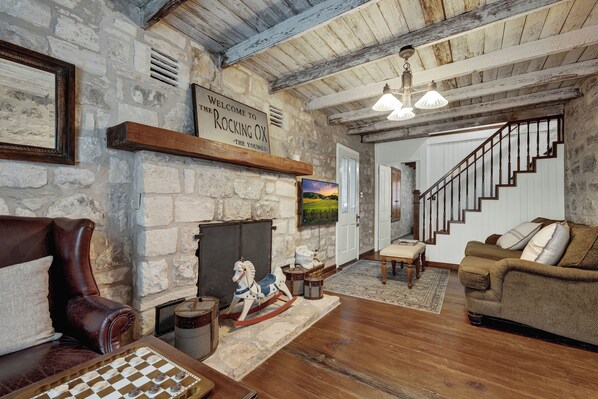Relax and play a game or watch a movie with family or friends in the living room