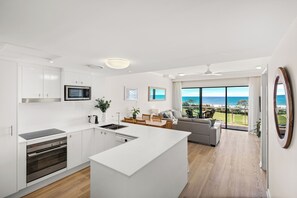 Great living space with full kitchen, dining room, lounge room and balcony