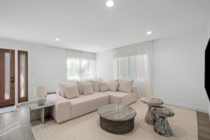 Light floods this tranquil living space.