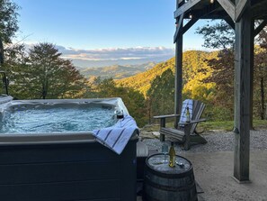 The hot tub has incredible views of the mountains. 