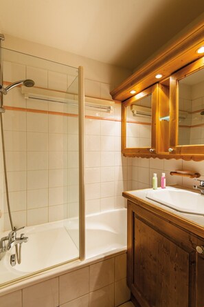 Get ready for your day in the lovely bathroom.