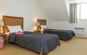Get a peaceful night sleep in our cozy bedroom.