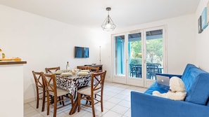 Reconnect with loved ones over a meal at the dining table.