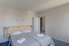 There may be either 2 Single beds or a Double bed in the bedroom!