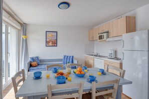 Share meals and laughs at the dining table.