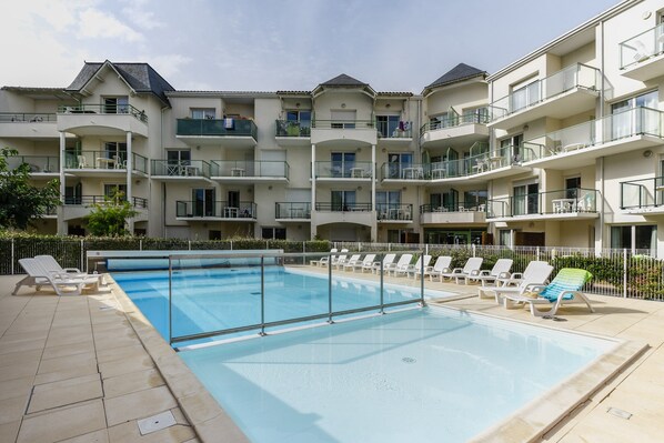 Get some sun in the outdoor pool.