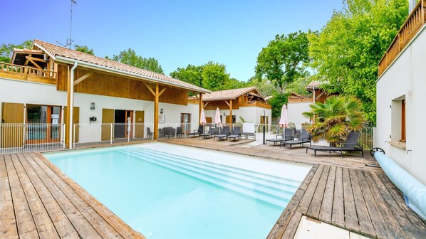 Dive into the lovely outdoor pool during the summer.