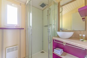 Get ready for your day in the lovely bathroom with shower.