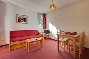 Kick back your feet and relax in the cozy living area.