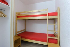 Get a good night's rest in the cozy bedroom.