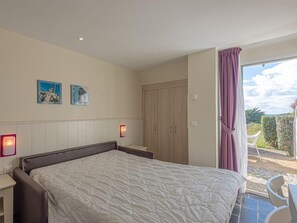 Drift to sleep in a comfortable bed after a wonderful day outside. Bedding configurations vary.