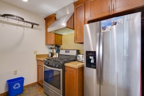 Indoors,Floor,Flooring,Refrigerator,Kitchen