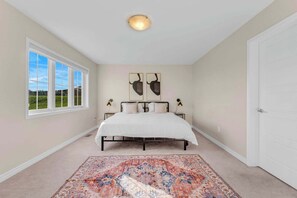 Spacious luxury awaits! our home features a huge master bedroom with a California King bed, complemented by three queen bedrooms for ultimate comfort and relaxation. 