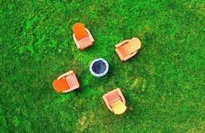 Gather around the warmth of our cozy fire pit. Firewood provided.