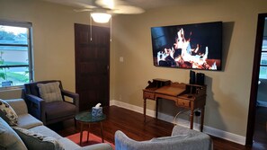 Livingroom with a smart TV. You can enjoy your favorite games and   our cable TV