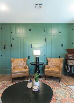 Feature wall made from doors & hardware from the original house built in 1920.