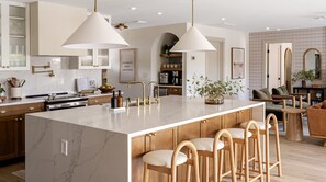 Open concept kitchen with everything you need to cook up a delicious meal while watching your kids swim in back yard or watch a show in the living room.  You’ll never miss a moment just because you’re cooking. 