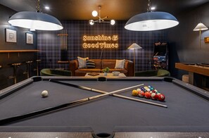 Hub of excitement and leisure. Let’s have a friendly competition playing pool and shuffleboard. A widescreen TV and plush sofa provided a cozy spot for movie nights or gaming sessions, ensuring endless entertainment for guests of all ages.