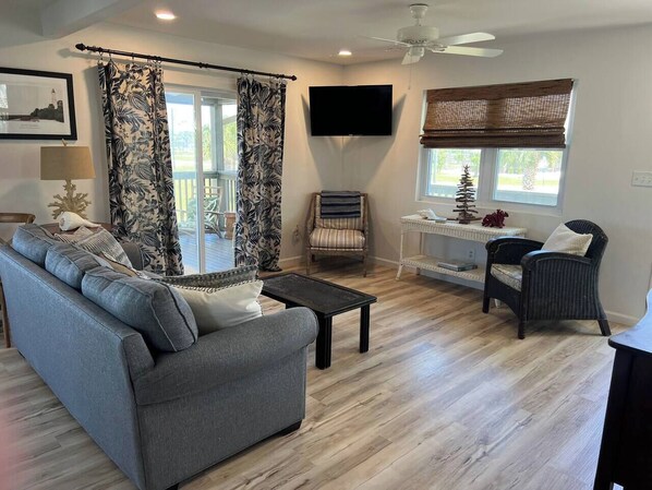 Living room with screen porch access