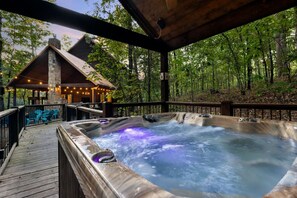 Take a relaxing soak in the hot tub while the kids play nearby
