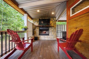 Warm up by the outdoor fireplace