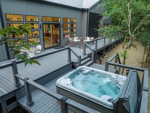 Over 1500 sq-ft of decking backing up to private views of peaceful forest